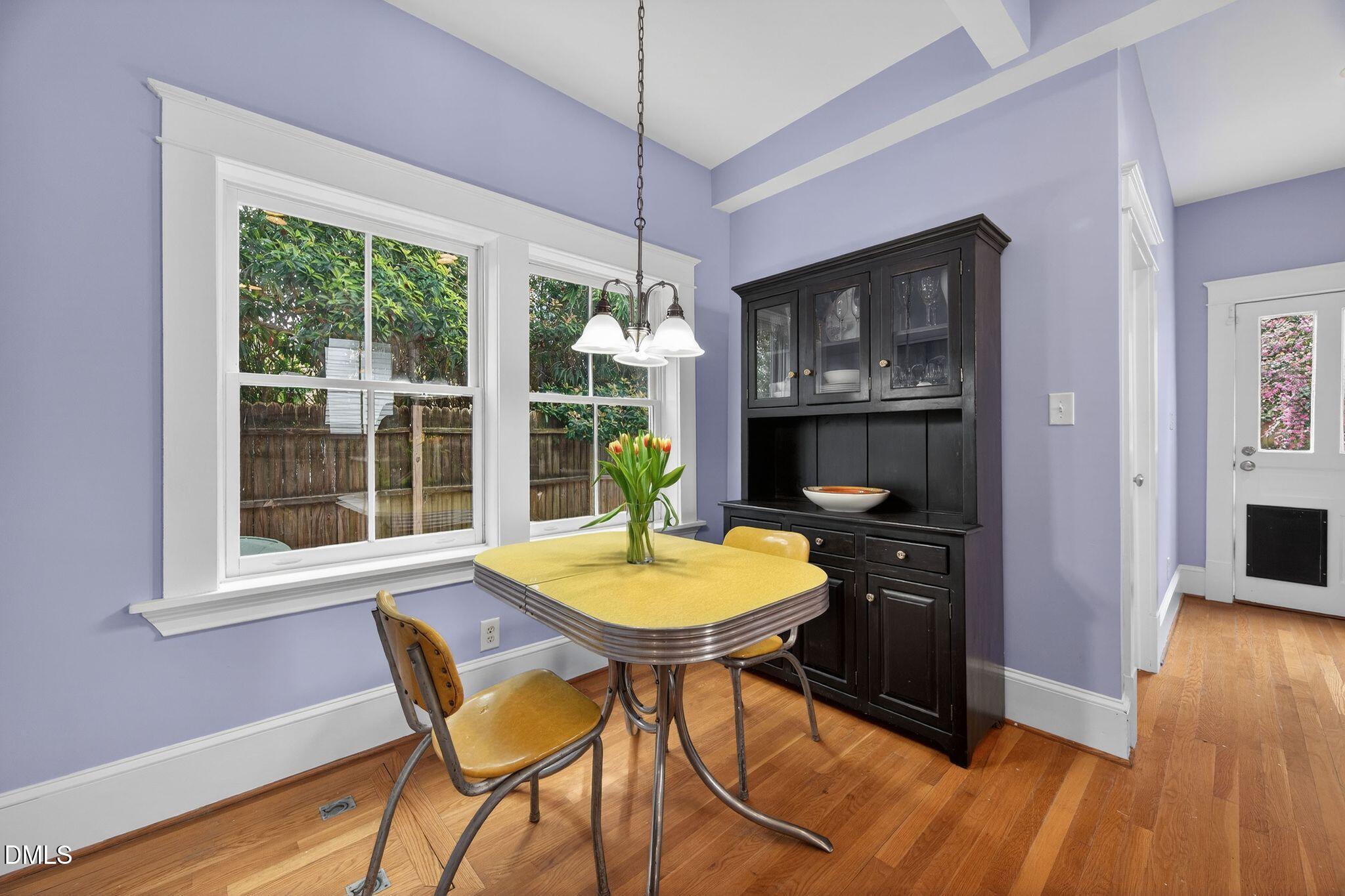 218 Pace Street Raleigh, NC 27604 - Photo 20 of 43 a view of a dining room with furniture window and wooden floor
