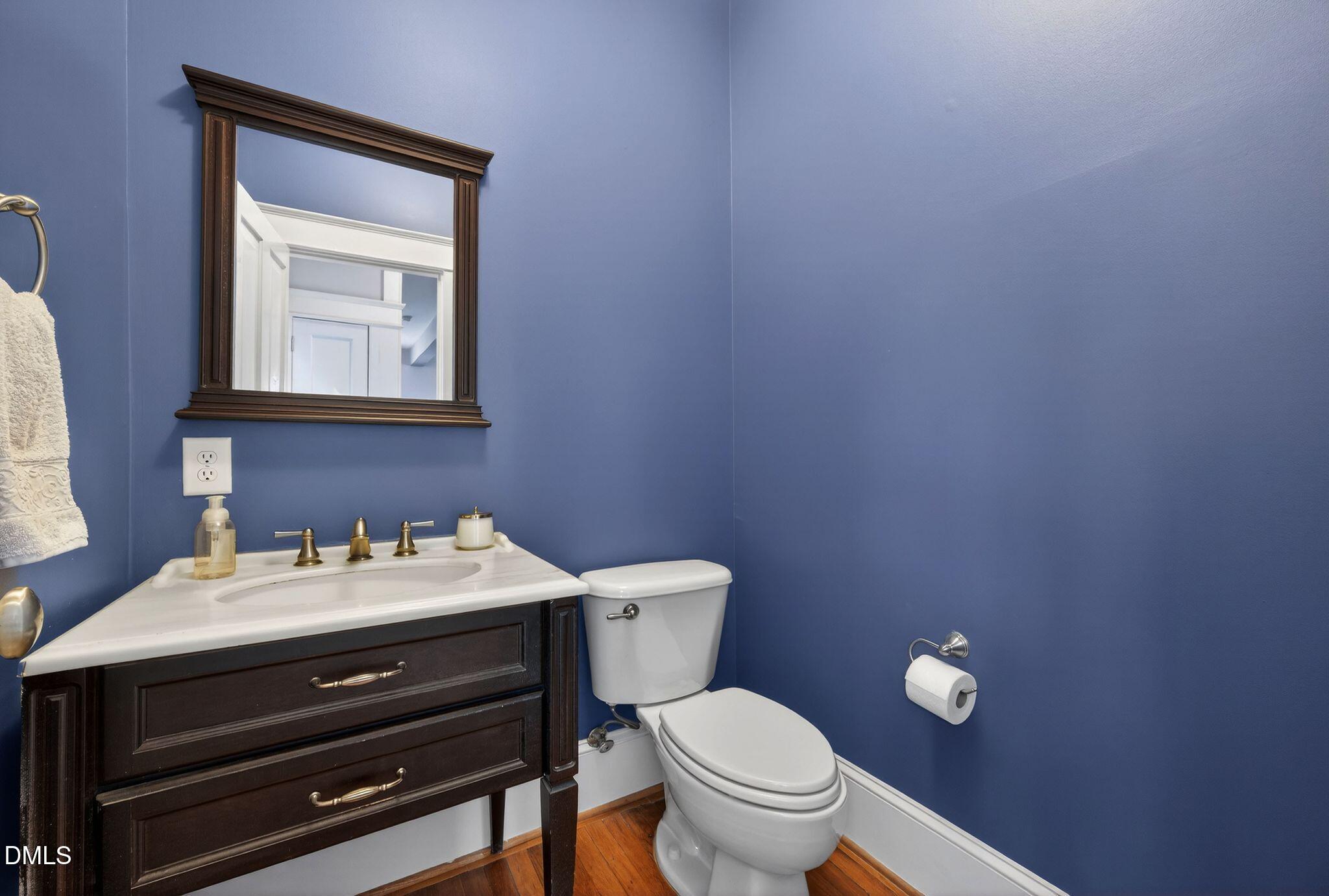 218 Pace Street Raleigh, NC 27604 - Photo 21 of 43 a bathroom with a toilet sink and mirror