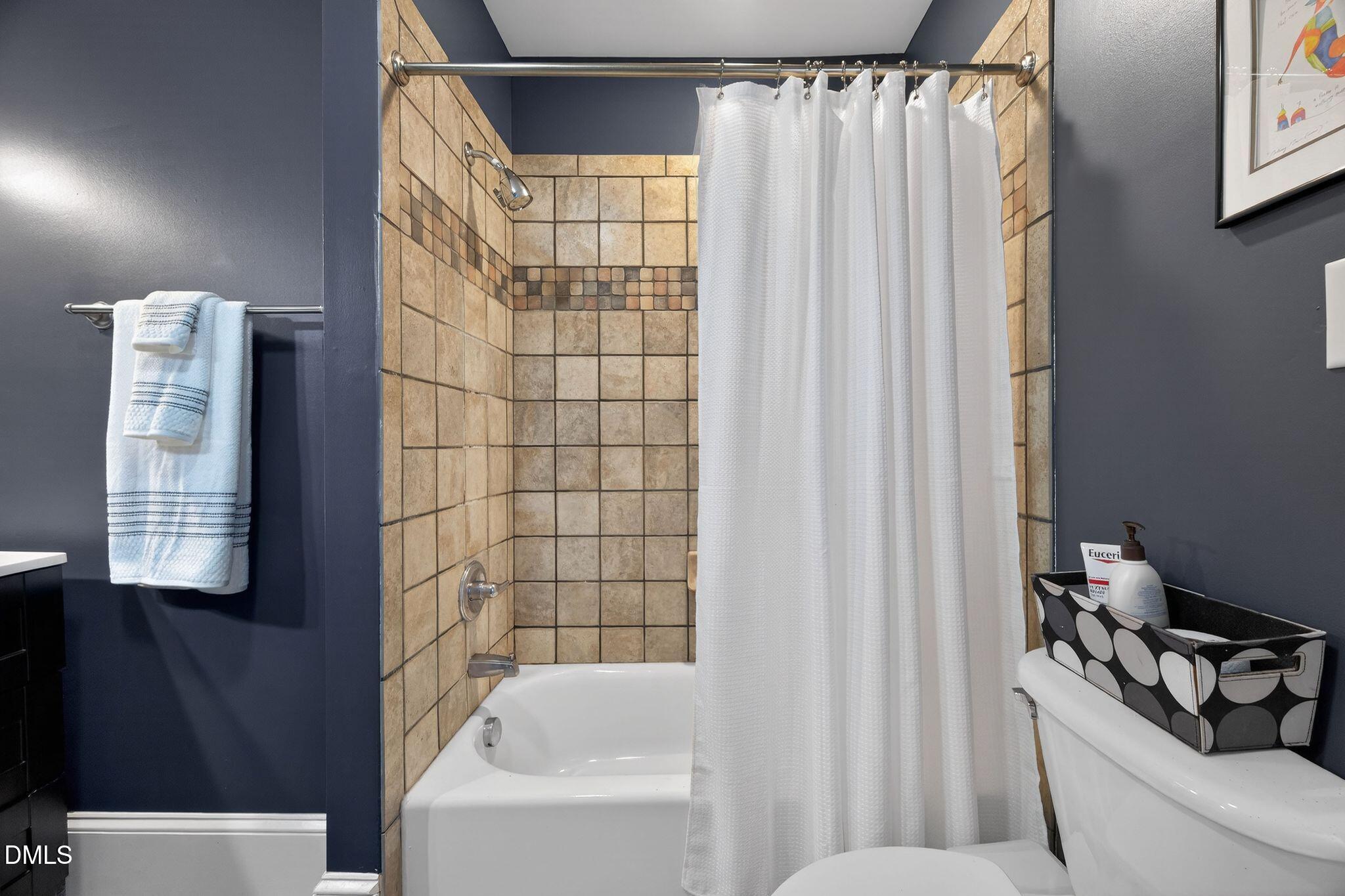 218 Pace Street Raleigh, NC 27604 - Photo 27 of 43 a bathroom with a bathtub and shower