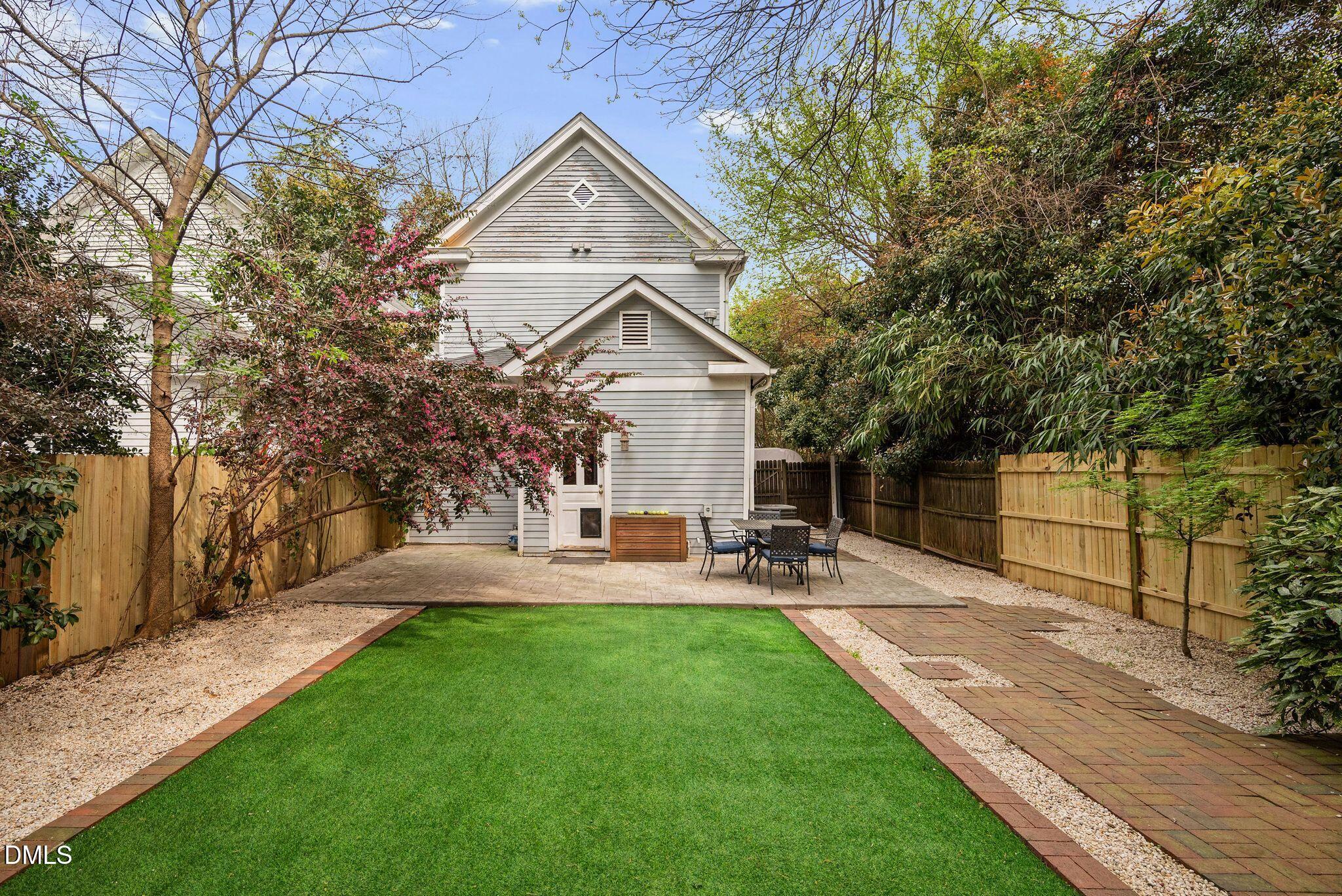 218 Pace Street Raleigh, NC 27604 - Photo 38 of 43 a front view of a house with patio and garden