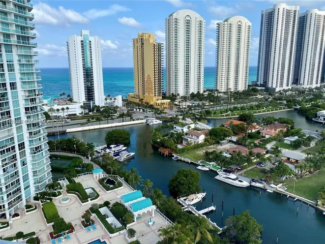 a view of a city with tall buildings