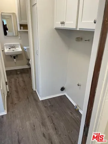 a view of a kitchen from the sink