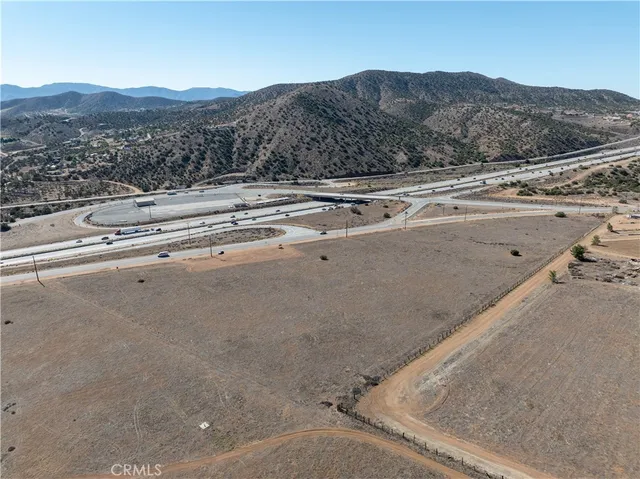 a view of a road with an ocean view