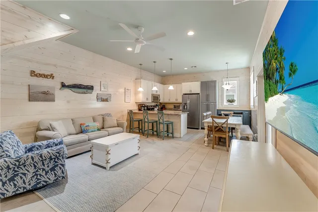 a living room with furniture and a table