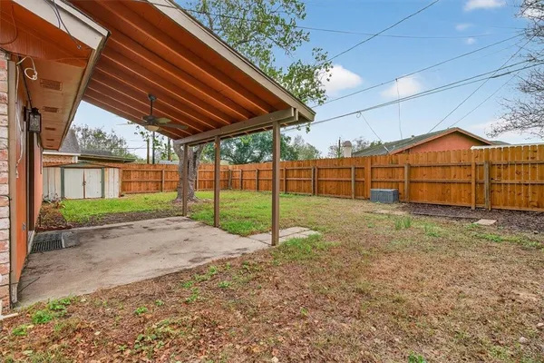 a view of a backyard with a garden