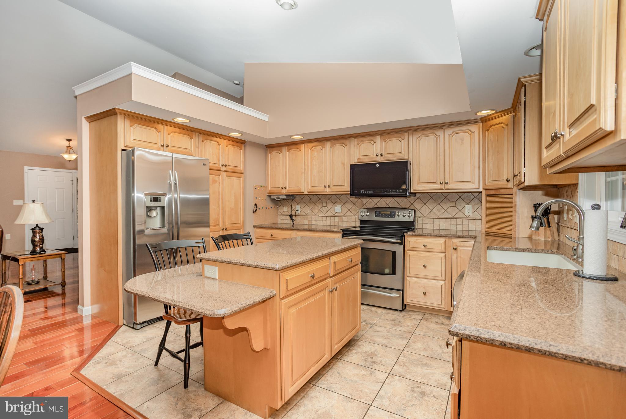 714 Heather Ridge Manheim, PA 17545 - Photo 11 of 33 a kitchen with a sink stove and refrigerator