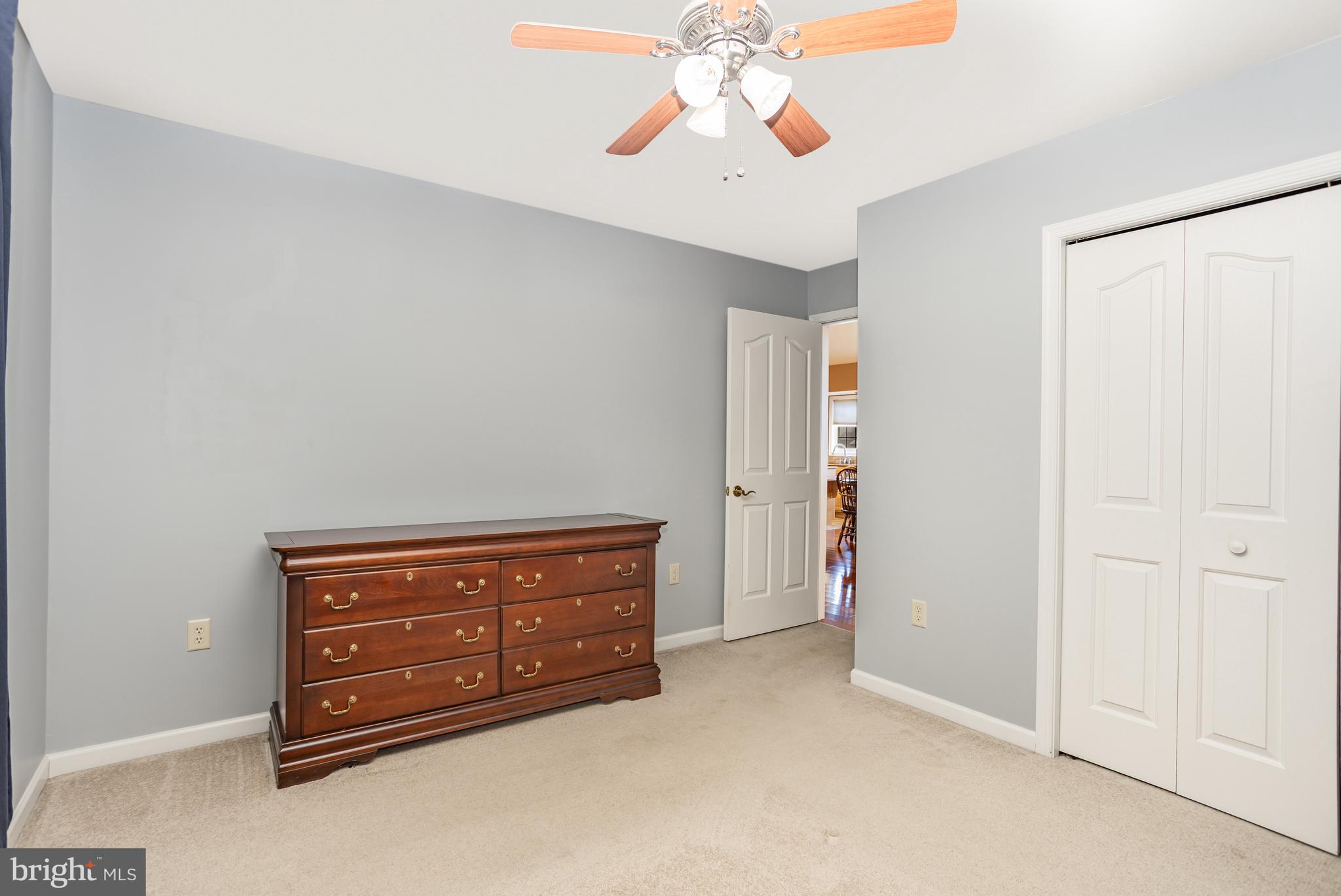 714 Heather Ridge Manheim, PA 17545 - Photo 15 of 33 a room with a dresser and a chandelier