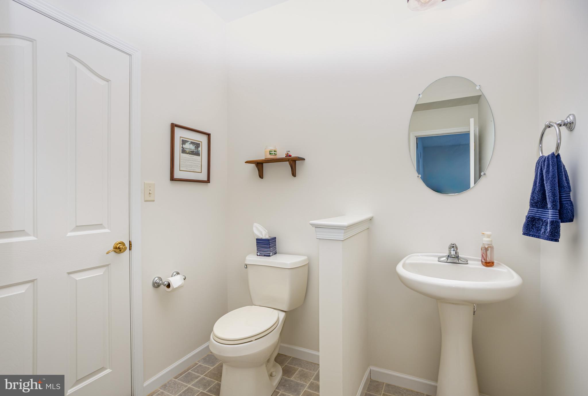 714 Heather Ridge Manheim, PA 17545 - Photo 24 of 33 a bathroom with a toilet sink and mirror