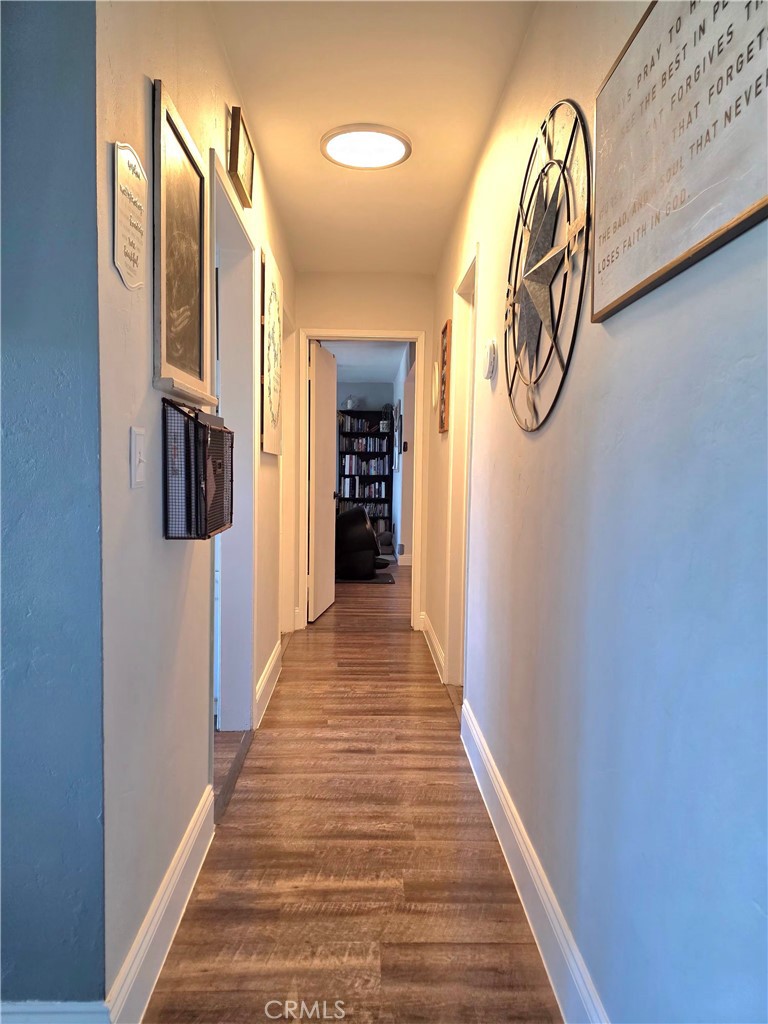 1200 West Lambert Road, Unit 32 La Habra, CA 90631 - Photo 16 of 34 a view of a hallway with wooden floor and entryway