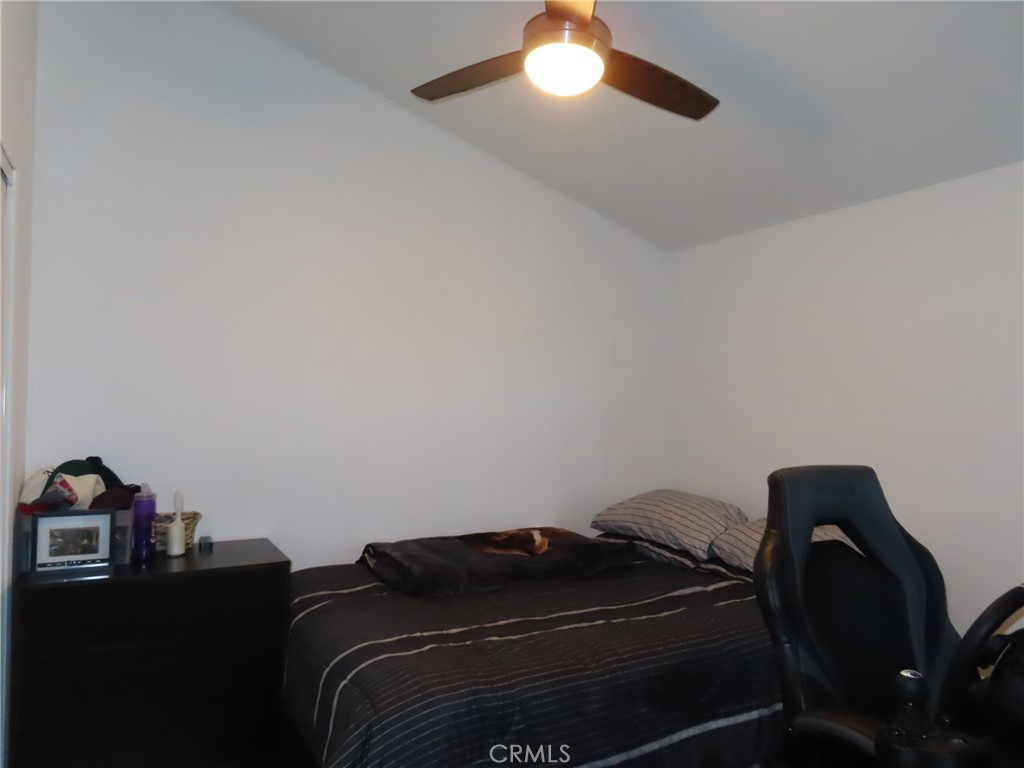 1200 West Lambert Road, Unit 32 La Habra, CA 90631 - Photo 18 of 34 a bedroom with a bed
