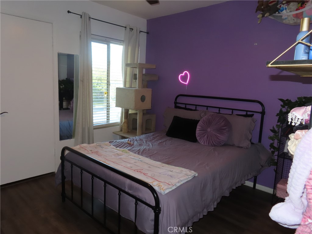 1200 West Lambert Road, Unit 32 La Habra, CA 90631 - Photo 19 of 34 a bedroom with a bed and a table