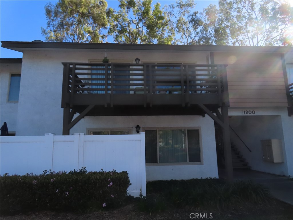 1200 West Lambert Road, Unit 32 La Habra, CA 90631 - Photo 2 of 34 a living room with a fireplace