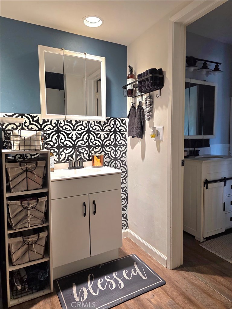 1200 West Lambert Road, Unit 32 La Habra, CA 90631 - Photo 23 of 34 a bathroom with a sink and a mirror