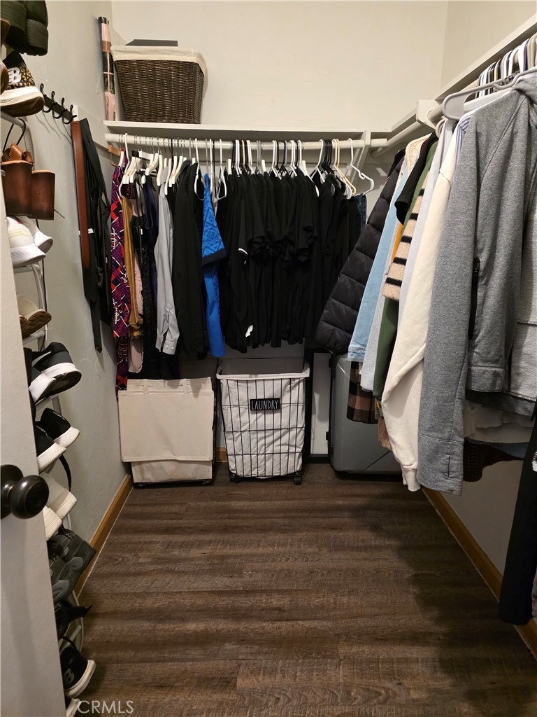 1200 West Lambert Road, Unit 32 La Habra, CA 90631 - Photo 27 of 34 a view of walk in closet with clothes and shoes