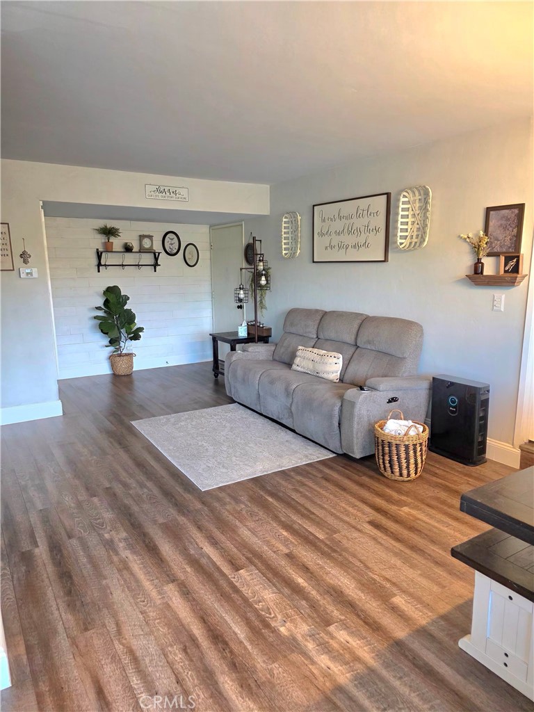1200 West Lambert Road, Unit 32 La Habra, CA 90631 - Photo 4 of 34 a living room with furniture and a table