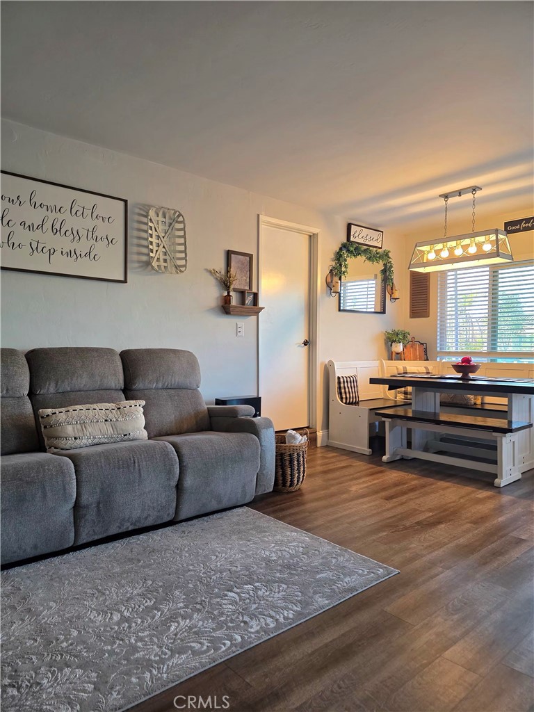 1200 West Lambert Road, Unit 32 La Habra, CA 90631 - Photo 6 of 34 a living room with furniture and a flat screen tv