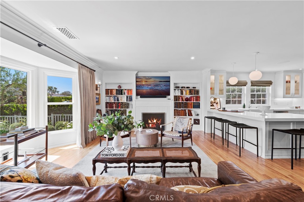 320 Broadway Costa Mesa, CA 92627 - Photo 2 of 25 a living room with furniture kitchen view and large windows