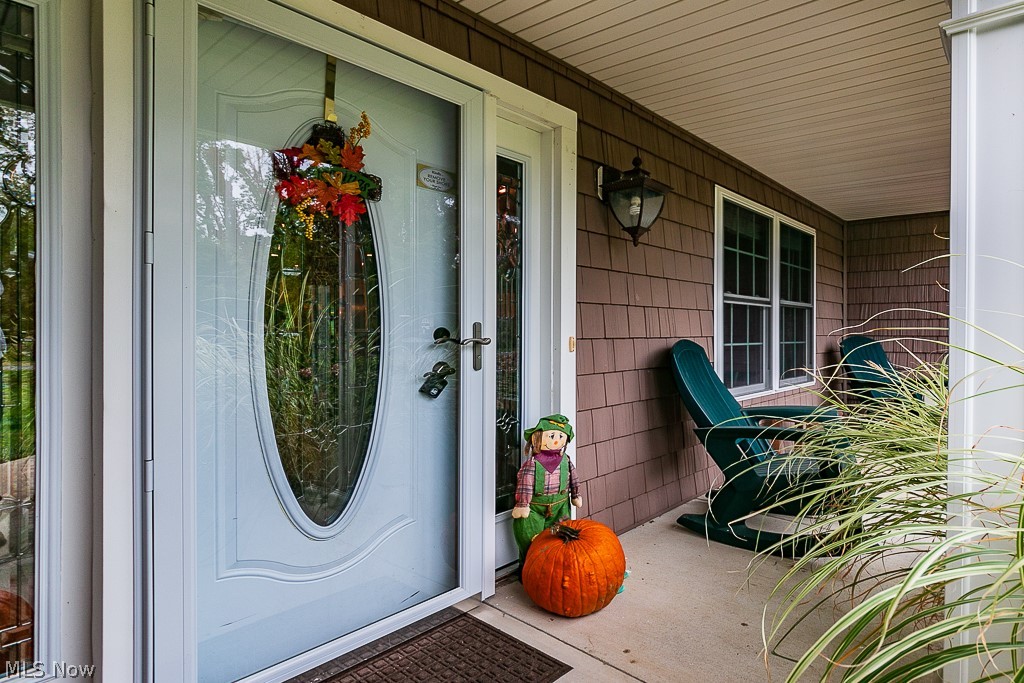 1074 Dock Road Madison, OH 44057 - Photo 3 of 35 You will love the covered front porch!