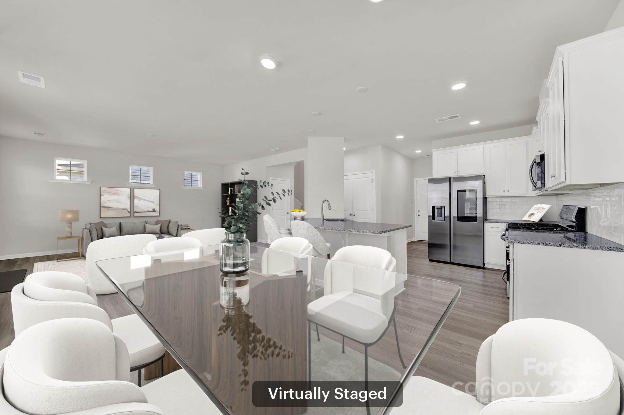 7721 Sea Turtle Way Lancaster, SC 29720 - Photo 11 of 46 a living room with furniture and kitchen view