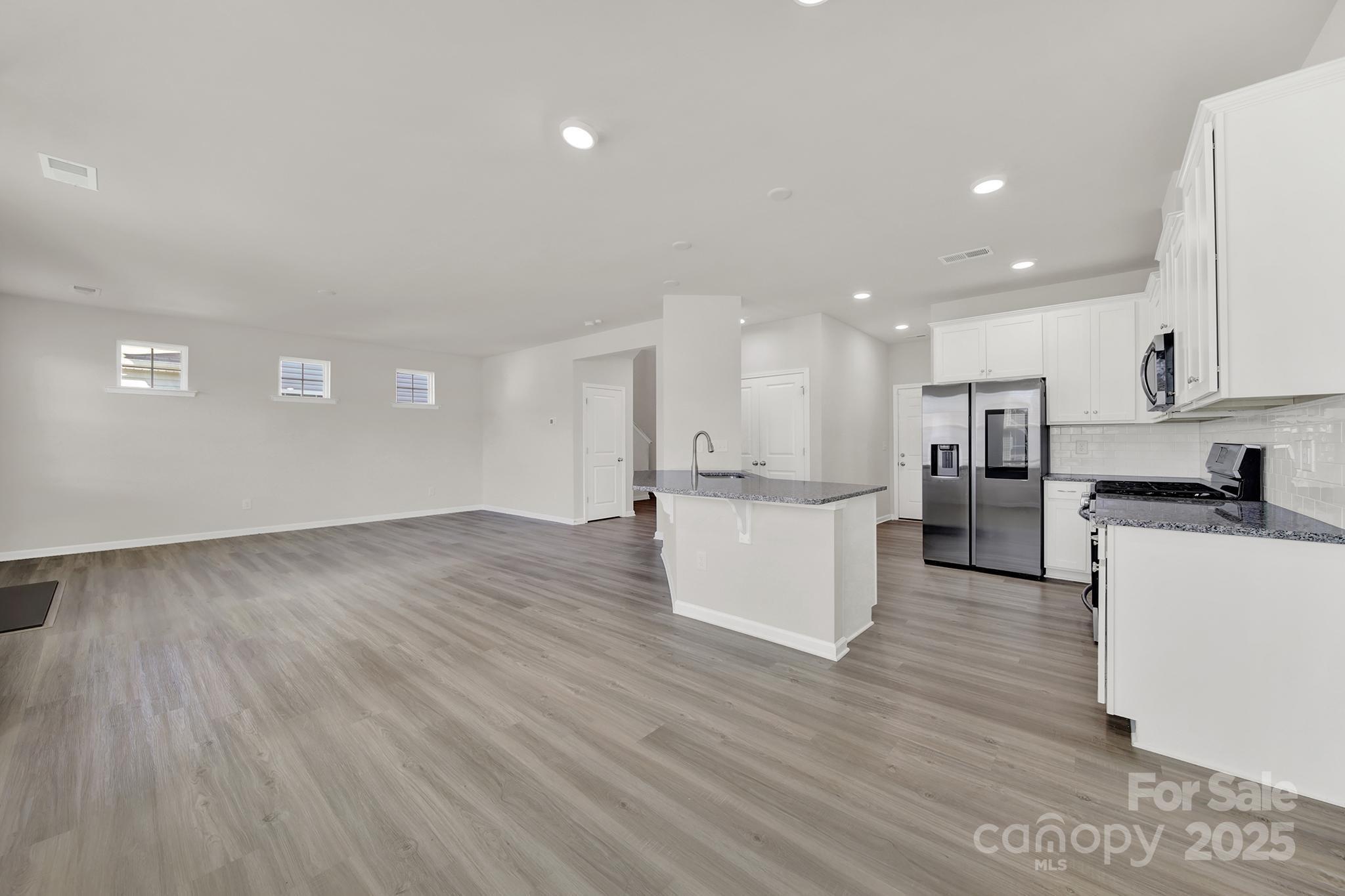7721 Sea Turtle Way Lancaster, SC 29720 - Photo 12 of 46 a view of kitchen with wooden floor