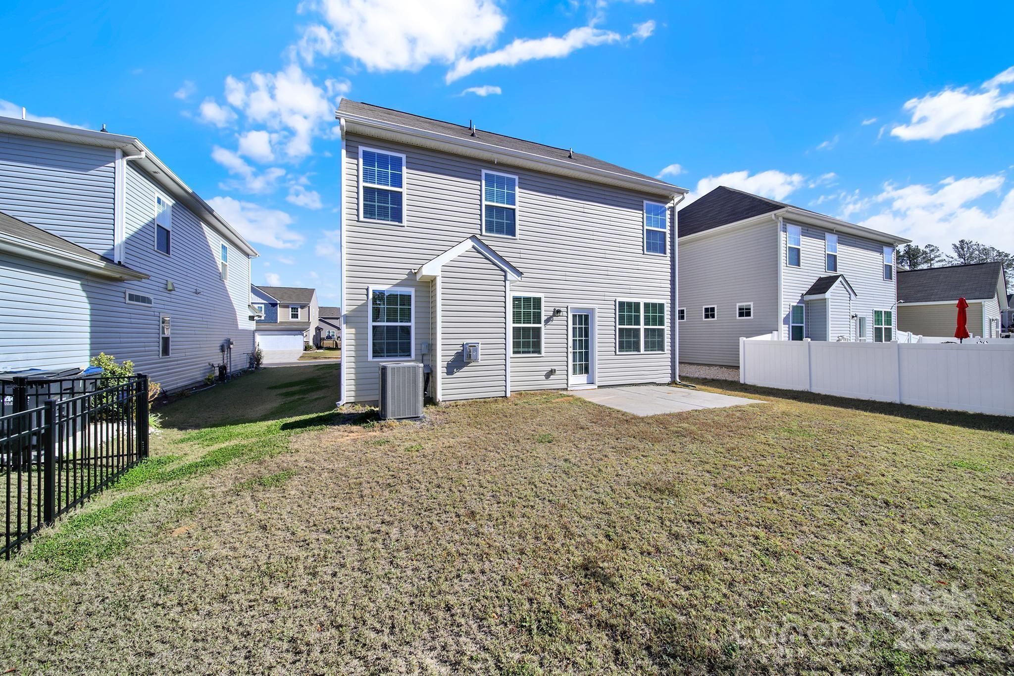 7721 Sea Turtle Way Lancaster, SC 29720 - Photo 34 of 46 a view of a house with a yard