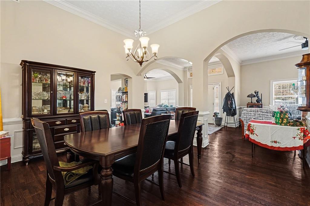 5026 Campbellton Road Southwest Atlanta, GA 30331 - Photo 17 of 39 a view of a dining room with furniture and wooden floor