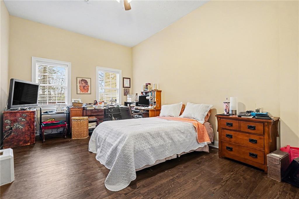 5026 Campbellton Road Southwest Atlanta, GA 30331 - Photo 21 of 39 a bedroom with a bed and furniture