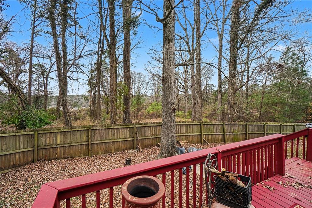 5026 Campbellton Road Southwest Atlanta, GA 30331 - Photo 34 of 39 a view of a roof deck with wooden fence and floor