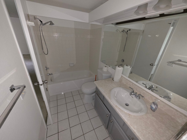 6852 Countrywoods Circle, Unit 5D Midvale, UT 84047 - Photo 28 of 50 Hall entrance to bathroom on left.