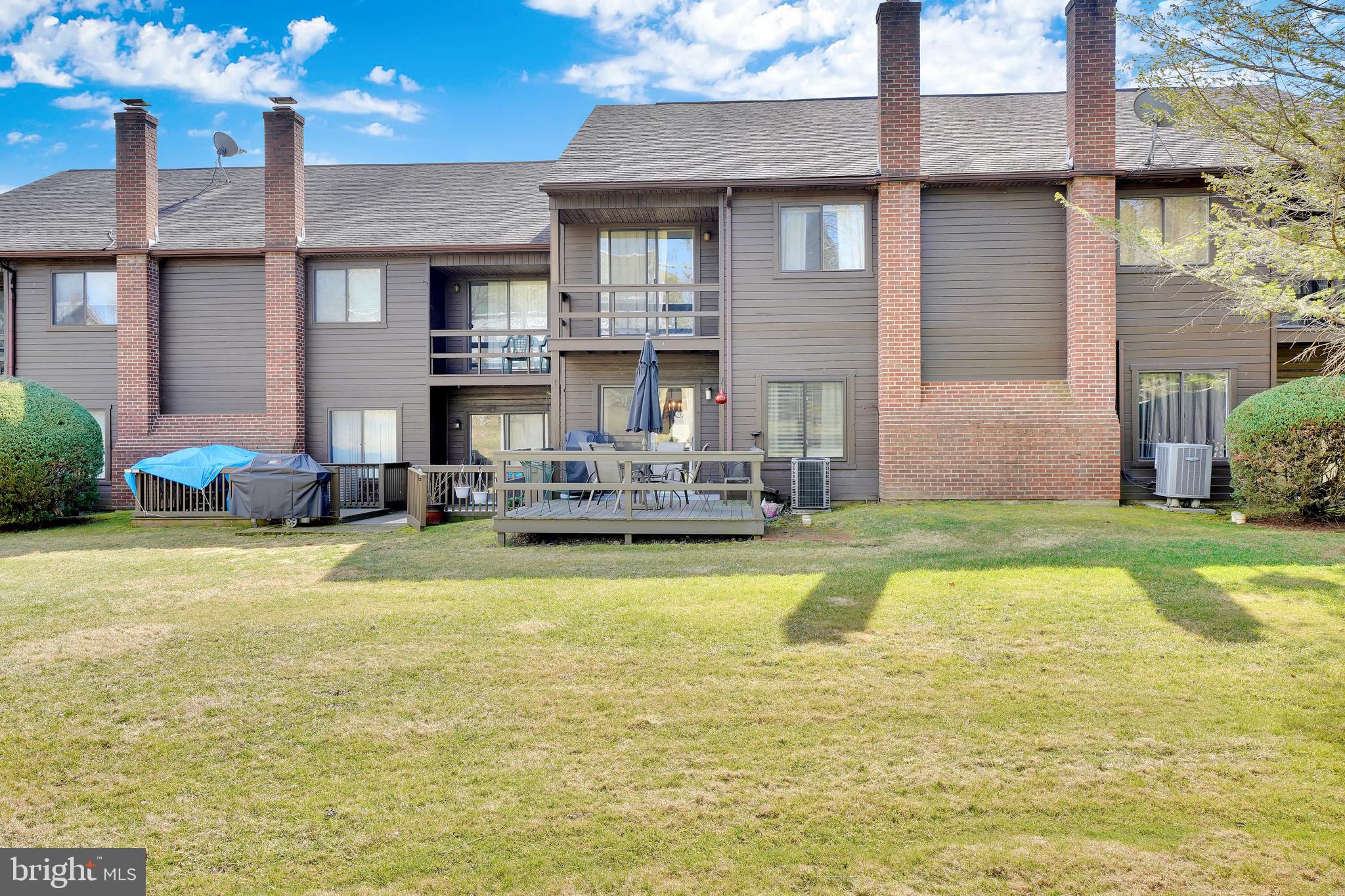 204 Village Road Orwigsburg, PA 17961 - Photo 26 of 27 BACK YARD WITH BALCONY AND PATIO