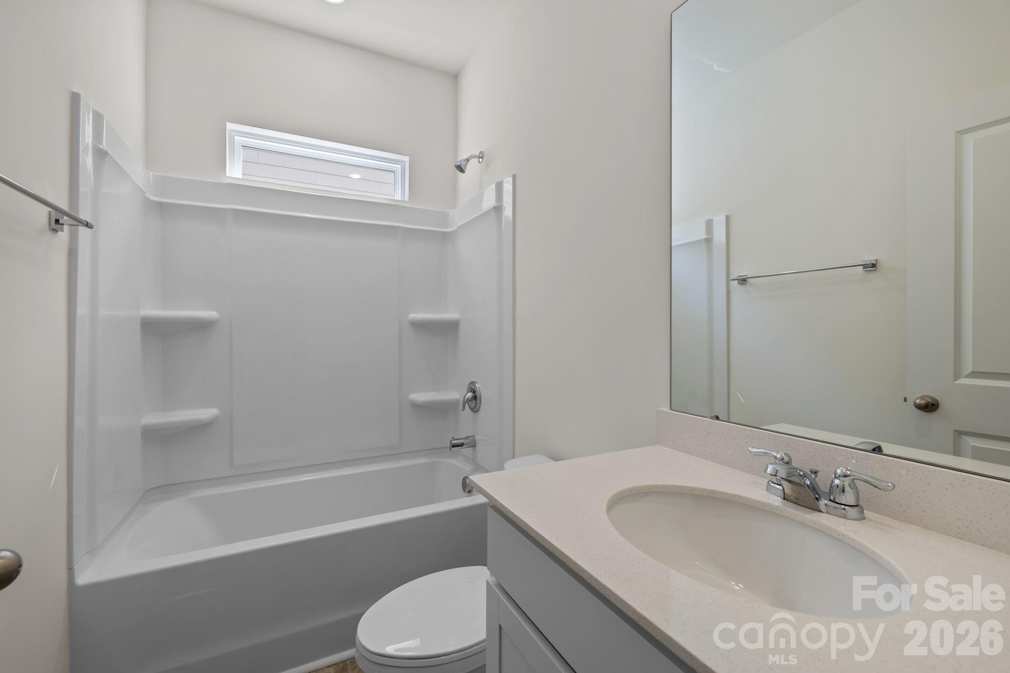 463 Brick House Road York, SC 29745 - Photo 17 of 35 a bathroom with a granite countertop sink toilet and shower