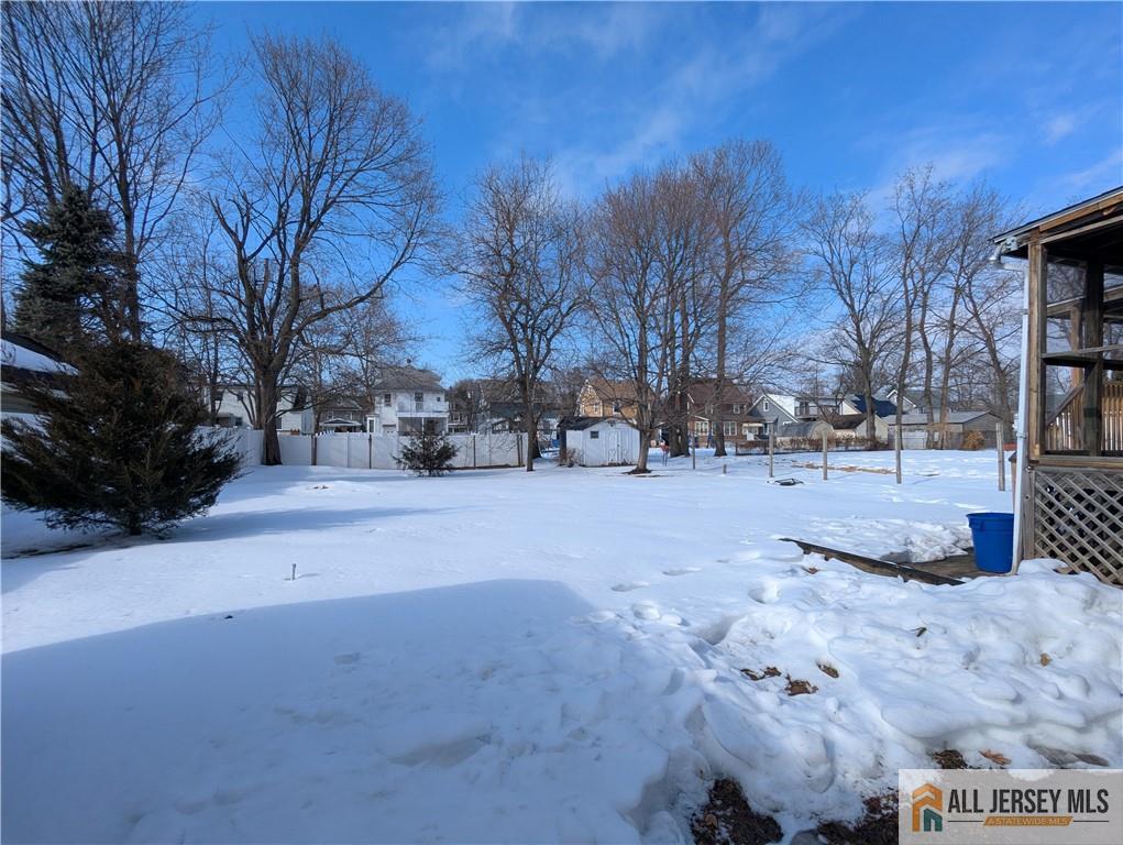 220 1st Street Dunellen, NJ 08812 - Photo 15 of 23 a street view covered with snow