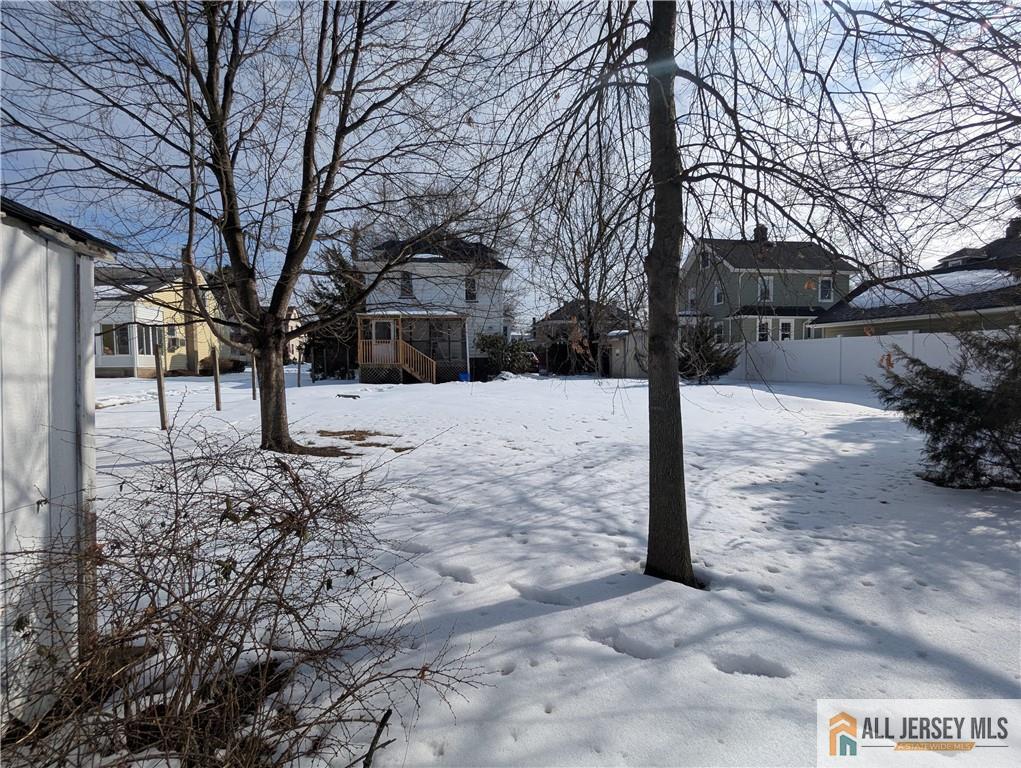 220 1st Street Dunellen, NJ 08812 - Photo 21 of 23 a street view covered with snow