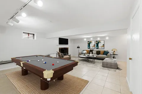 a living room with furniture and a table