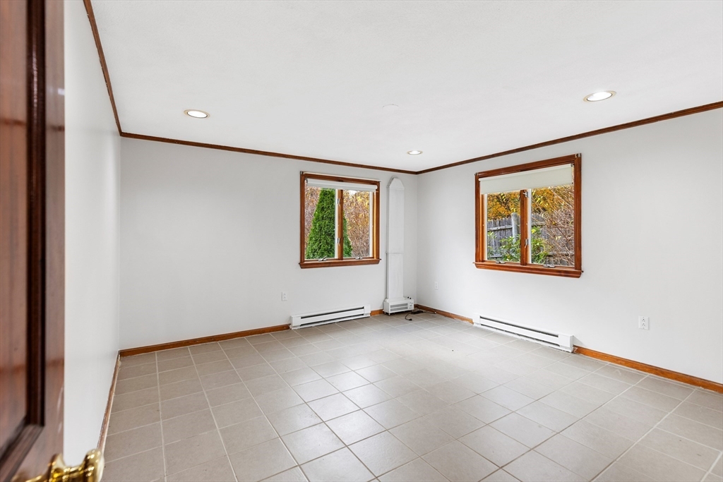 10 Apache Trail Medford, MA 02155 - Photo 28 of 41 an empty room with windows