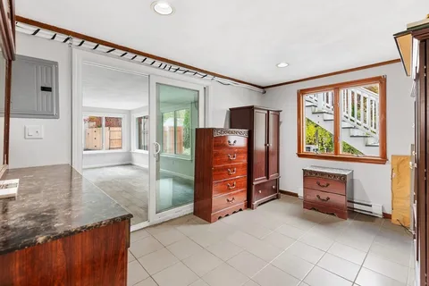 a view of livingroom with furniture and windows