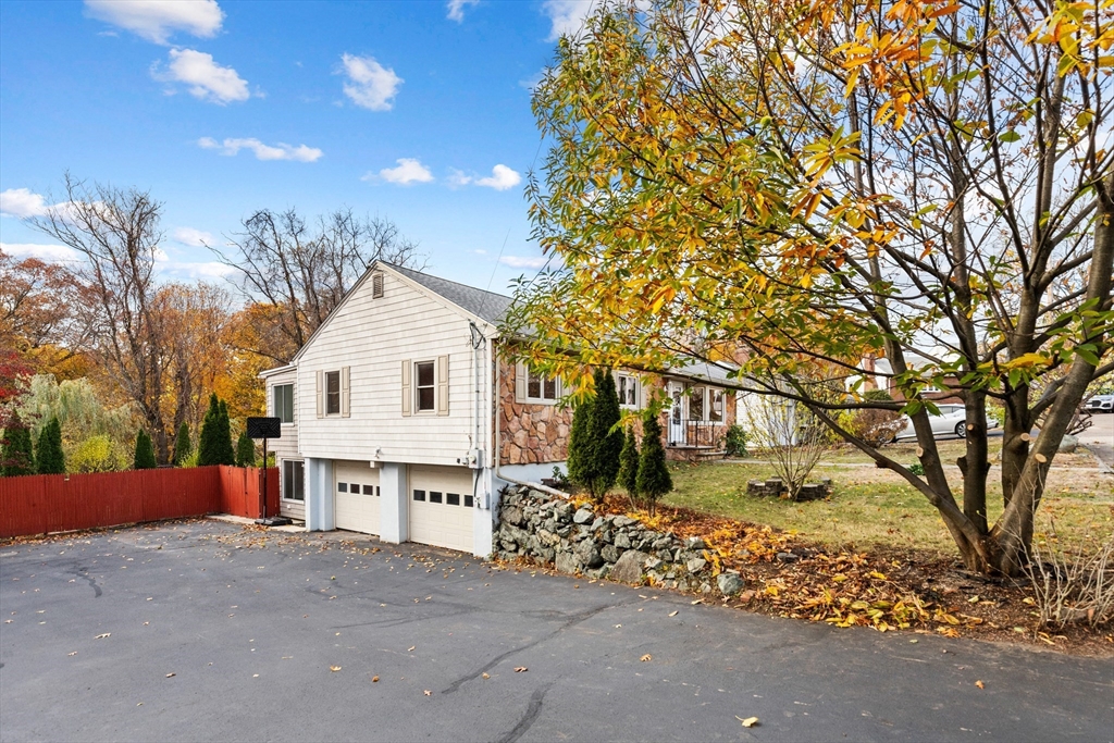 10 Apache Trail Medford, MA 02155 - Photo 35 of 41 a view of a house with a yard