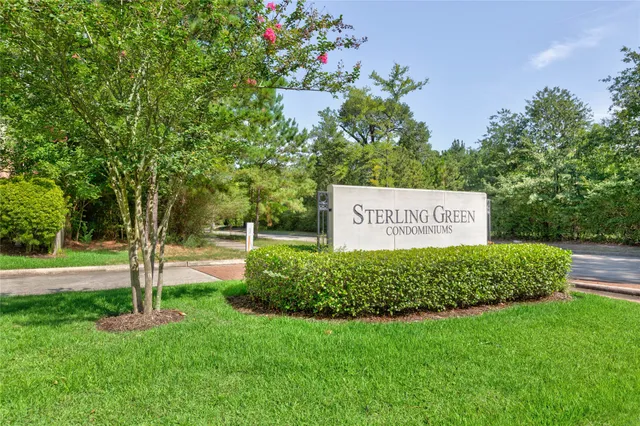 a front view of a house with a garage