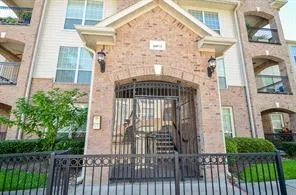 a view of statue in a garden