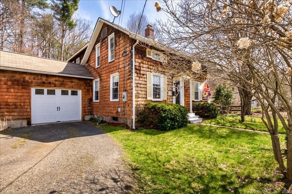 82 Bidwell Square Farmington, CT 06085 - Photo 1 of 1 a view of a house with backyard and garden