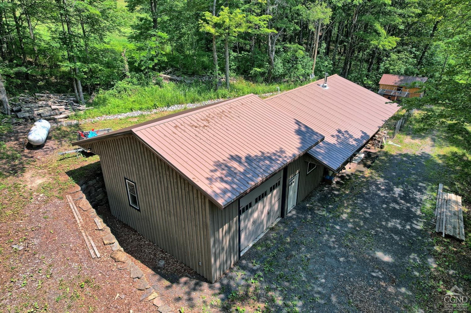 195 Gulf Rd Extension Rensselaerville, NY 12147 - Photo 7 of 57 a view of a backyard with a patio