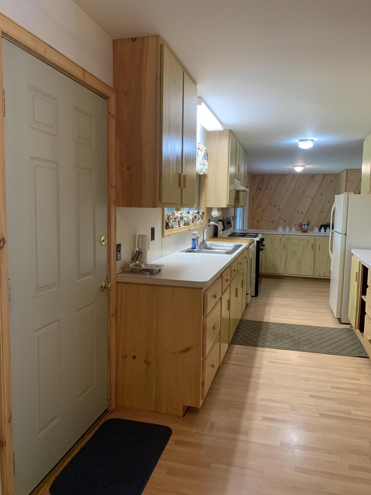 440 Gardiner Road Whitefield, ME 04353 - Photo 13 of 31 kitchen from garage entrance
