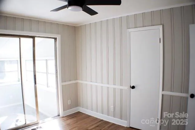 a view of entryway with wooden floor