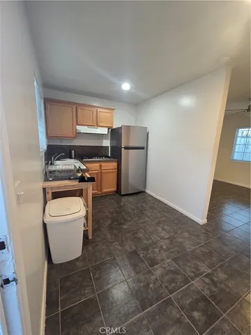 a room with furniture a washer and dryer