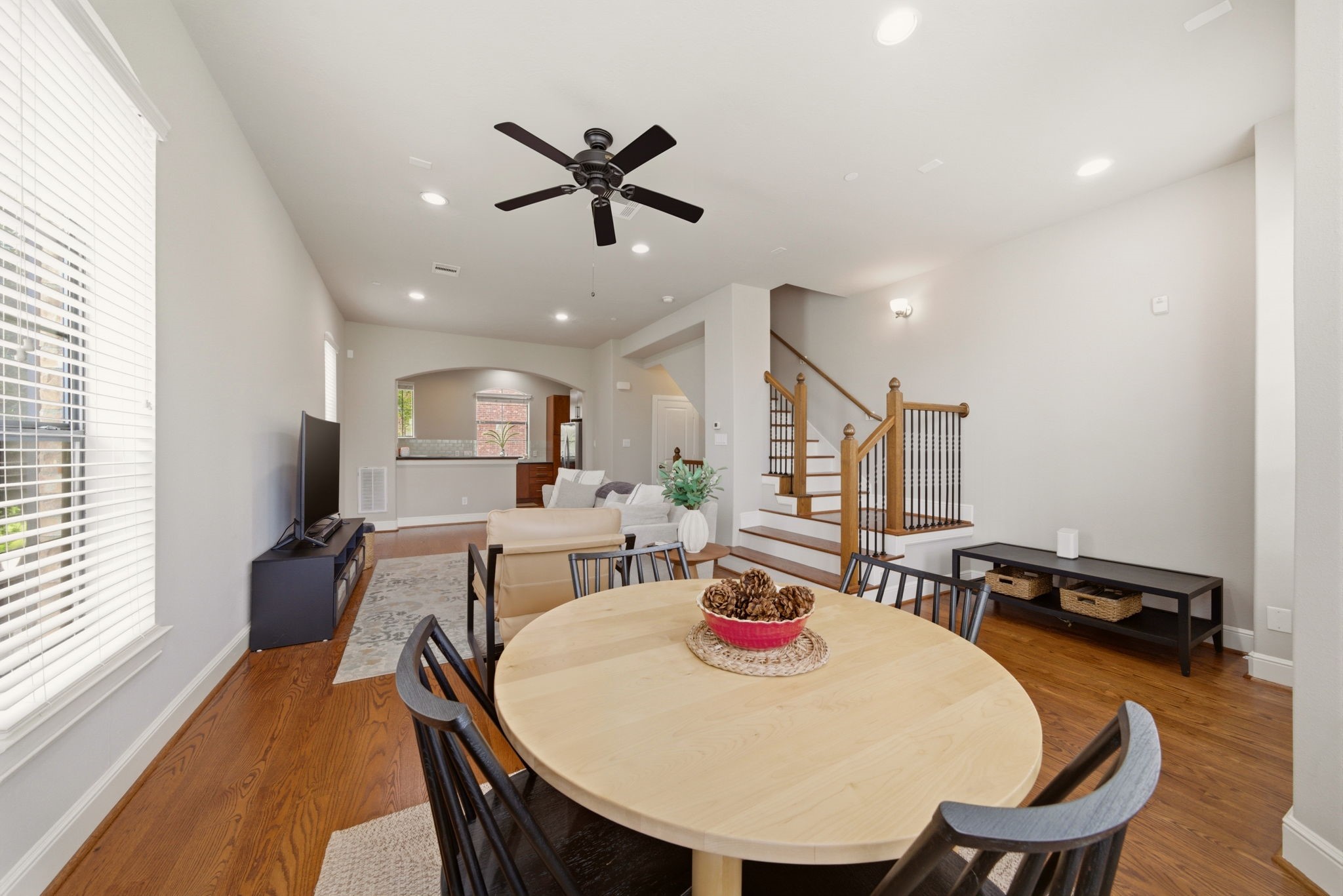 2110 Shearn Street, Unit 16 Houston, TX 77007 - Photo 13 of 37 Standing in the far corner of the second floor - looking towards the Living and Kitchen areas! Staircase was updated to hardwood floors - installed in 2024. Previously, staircase was carpeted