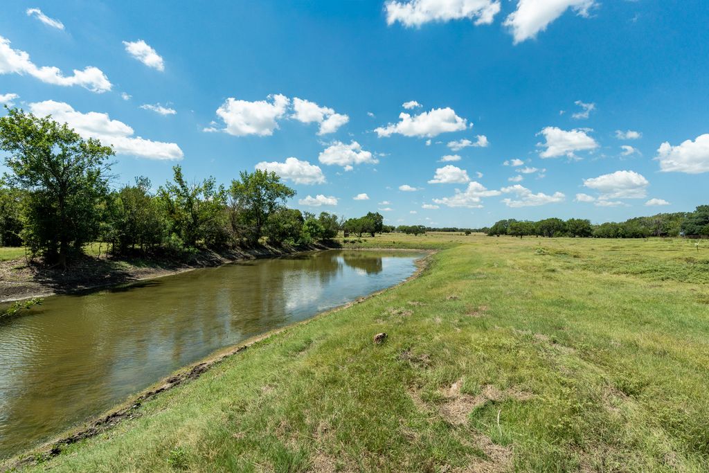 3550 County Road 245 Florence, TX 76527 - Photo 1 of 38 Fishing Pond - Recreational Paradise for many Family & Friends Events. Many options for sporting & recreational activities. Clay Shooting, Dirt Bike riding, Star Gazing, Nature walks, plenty to explore and enjoy! No known deed restrictions offer possible Event Center with Airbnb accommodations. Austin & Georgetown offer many Popular Events that bring in Thousands of folks from around the Globe.