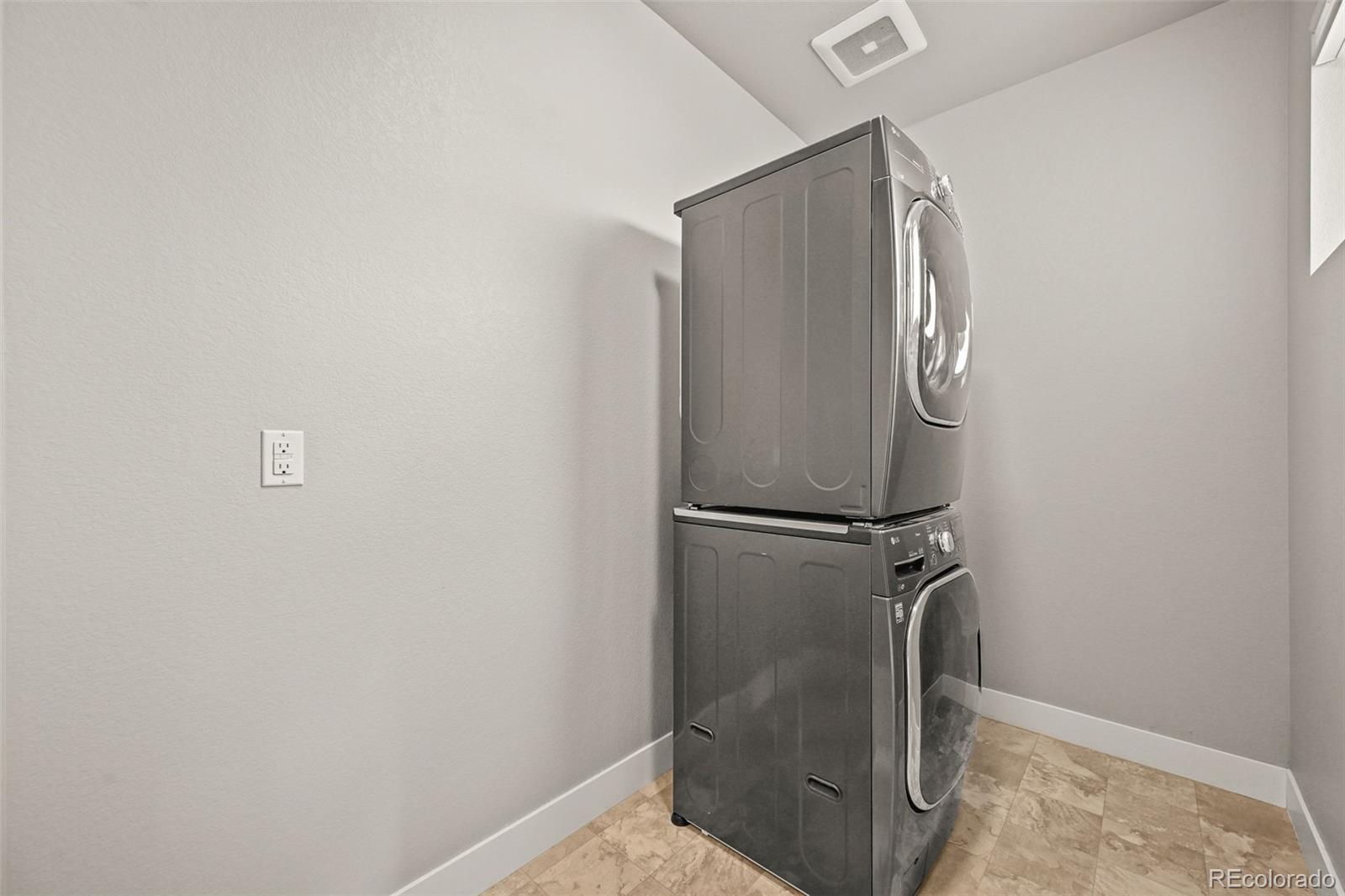 2880 West 69th Avenue Denver, CO 80221 - Photo 24 of 45 a bathroom with a glass shower door