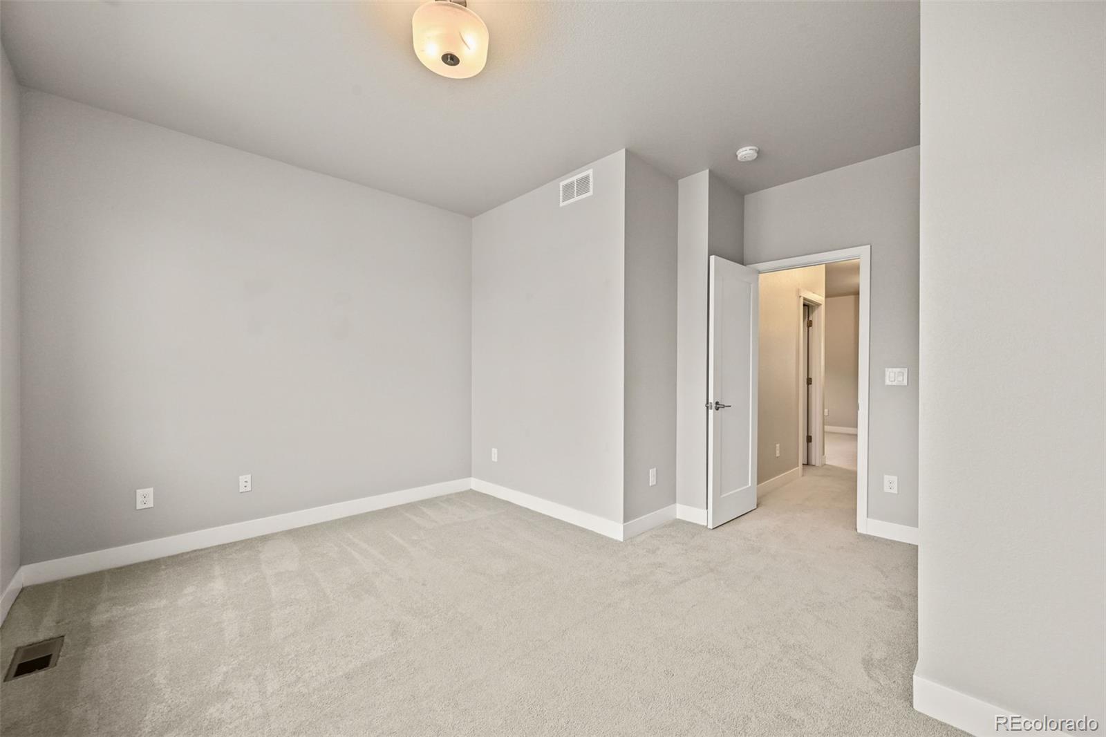 2880 West 69th Avenue Denver, CO 80221 - Photo 29 of 45 a view of an empty room