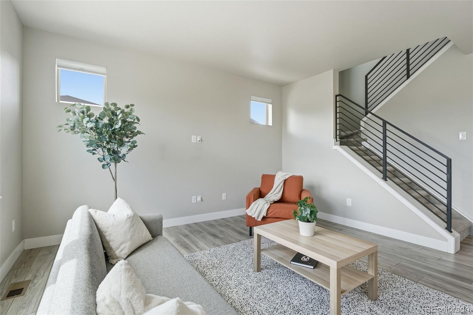 2880 West 69th Avenue Denver, CO 80221 - Photo 8 of 45 a living room with furniture