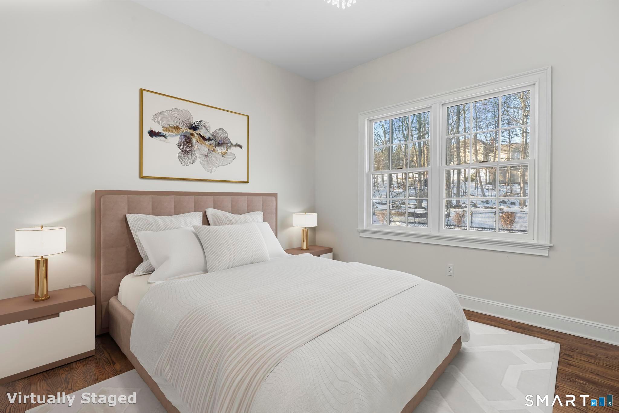 13 Surrey Lane Monroe, CT 06468 - Photo 18 of 40 a bedroom with a large bed and a window